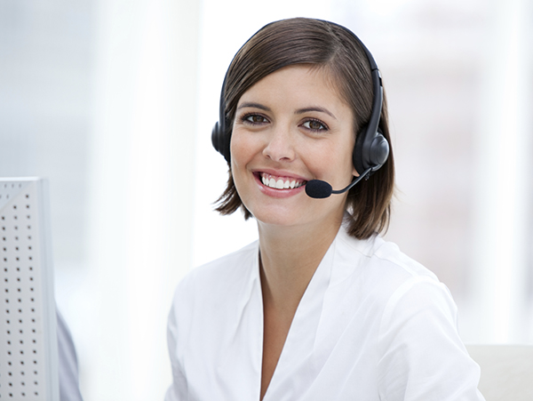 Portrait of a pretty customer agent at work